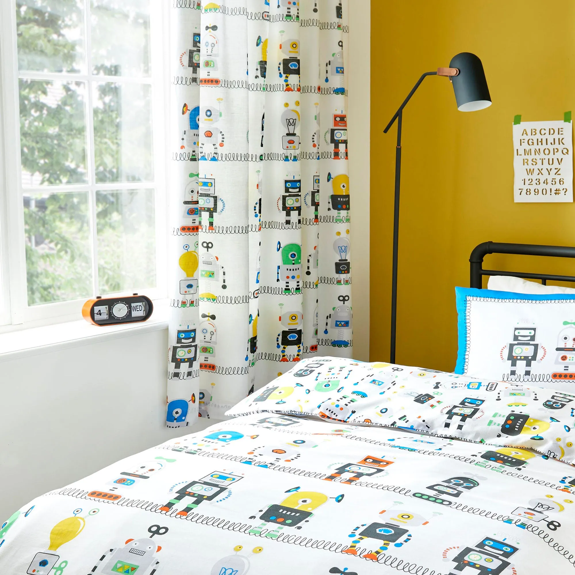 Robots Pair of Pencil Pleat Curtains by Bedlam in Blue